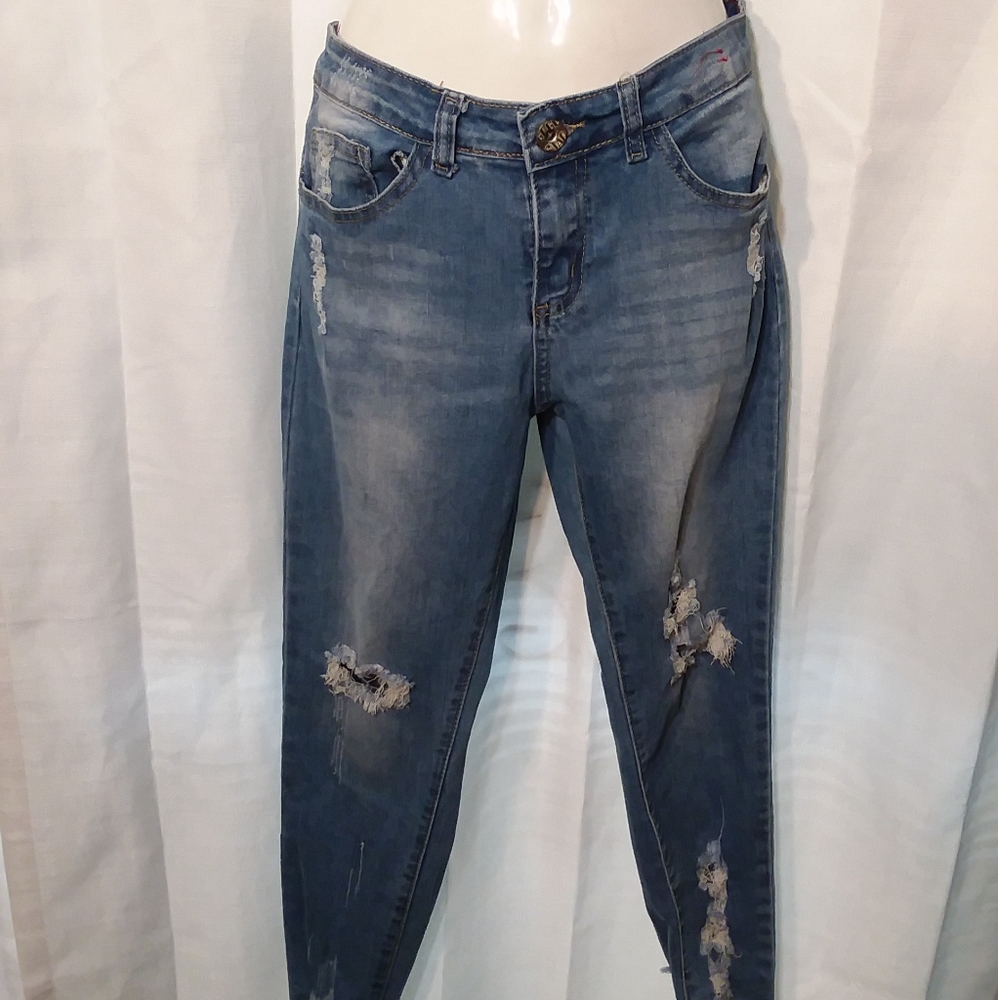 HIGH WAISTED RIPPED ANKLE-LENGTH SKINNY JEANS